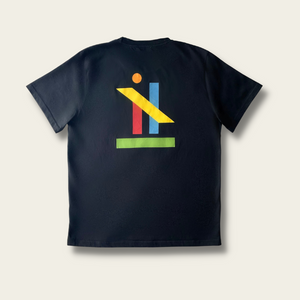 h clothing - flat shot of back of black tshirt with graphic of colourful geometric shapes