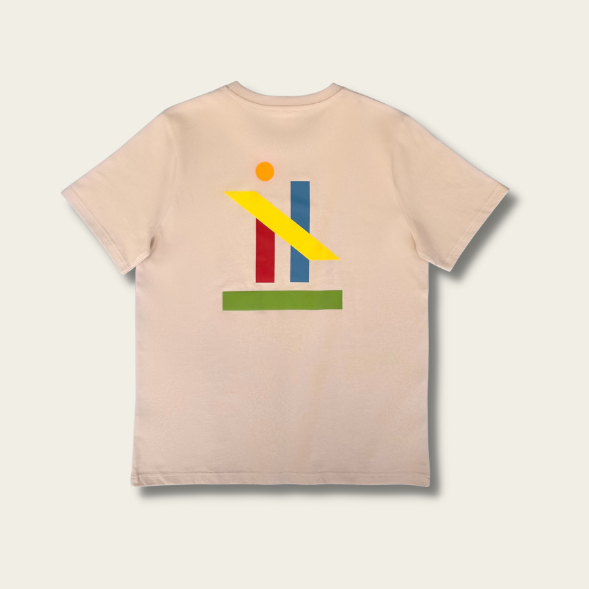 h clothing - flat shot of back of sandy tanned tshirt with graphic of colourful geometric shapes