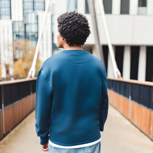h clothing - male model with back to camera wearing navy blue sweatshirt