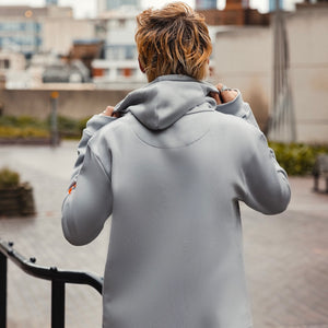 h clothing - male model with back to camera wearing heather grey hoodie