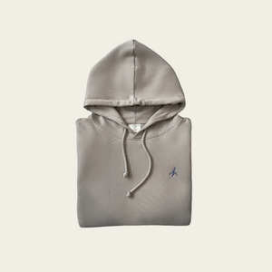 h clothing - flat shot of front of folded grey hoodie with blue h logo on left breast
