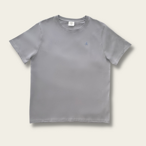 h clothing - flat shot of front of pastel grey tshirt with blue h logo on left breast