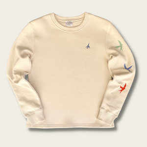 h clothing - flat shot of front of off-white sweatshirt with blue h logo on left breast and colourful birds down the left arm