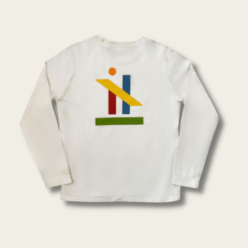 h clothing - flat shot of back of white long sleeved tshirt with graphic of colourful geometric shapes